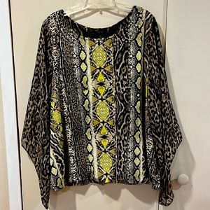 Plus size Beautiful Fun Animal Print Top with Full Bell Sleeves Bling Neck.